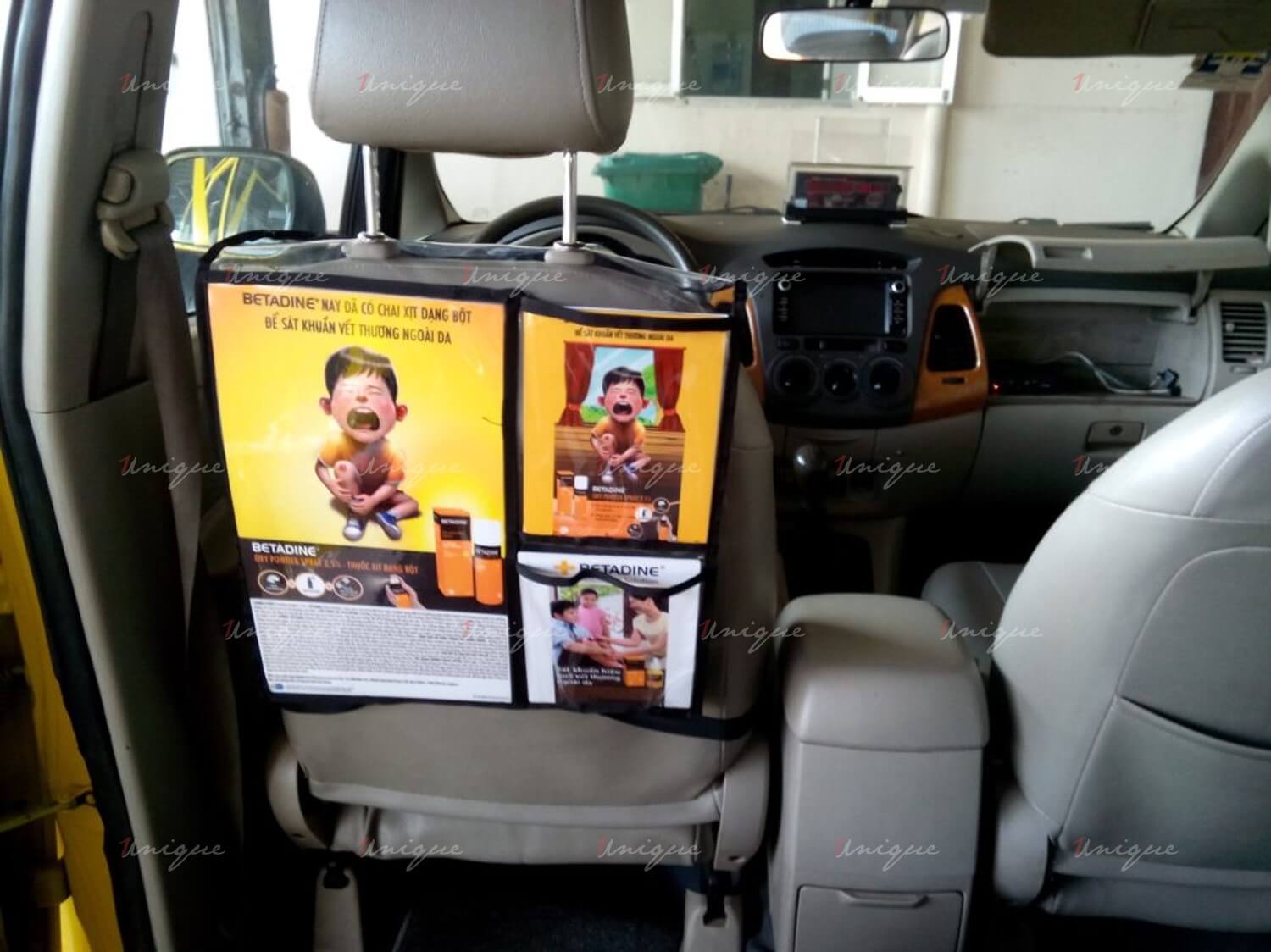 quảng cáo tờ rơi trên xe taxi