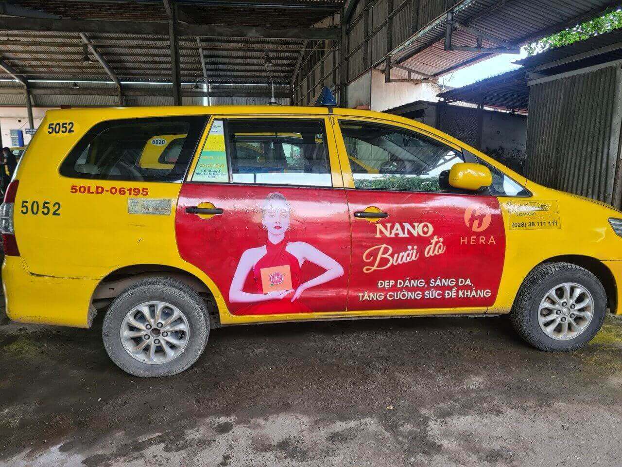 Hera nano bưởi đỏ quảng cáo dán full 4 cánh Vina taxi vàng